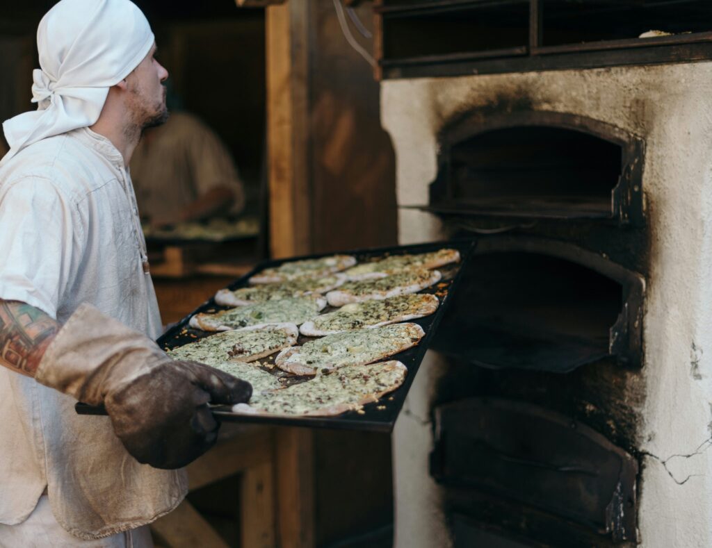 Traditional bread baking as a living culinary practice, reflecting UNESCO-recognised intangible cultural heritage